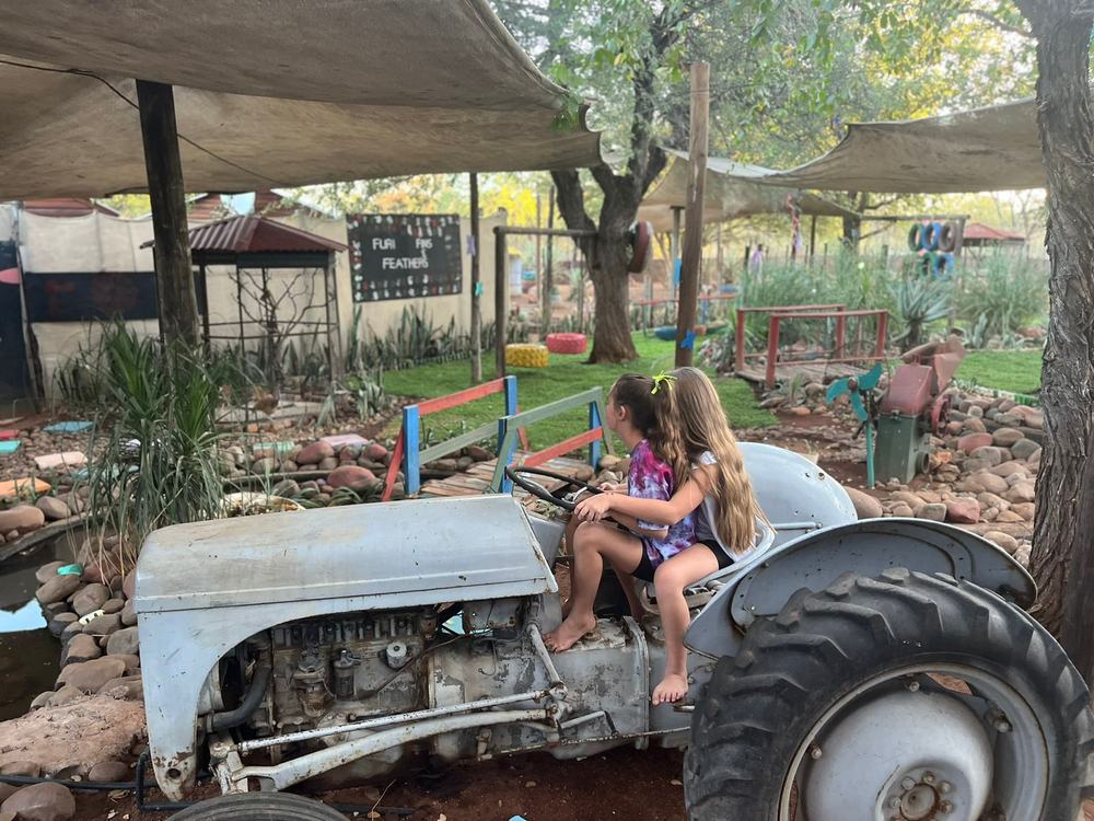 Children on vintage tractor