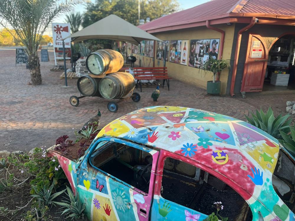 Painted car planter with PADSTAL entrance